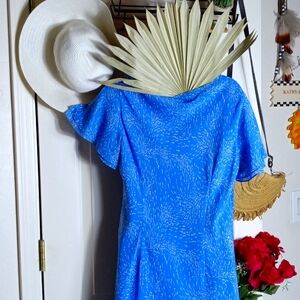 Dressy dress. 2 tiered fully lined dress with flutter 2 tiered sleeves and hem.